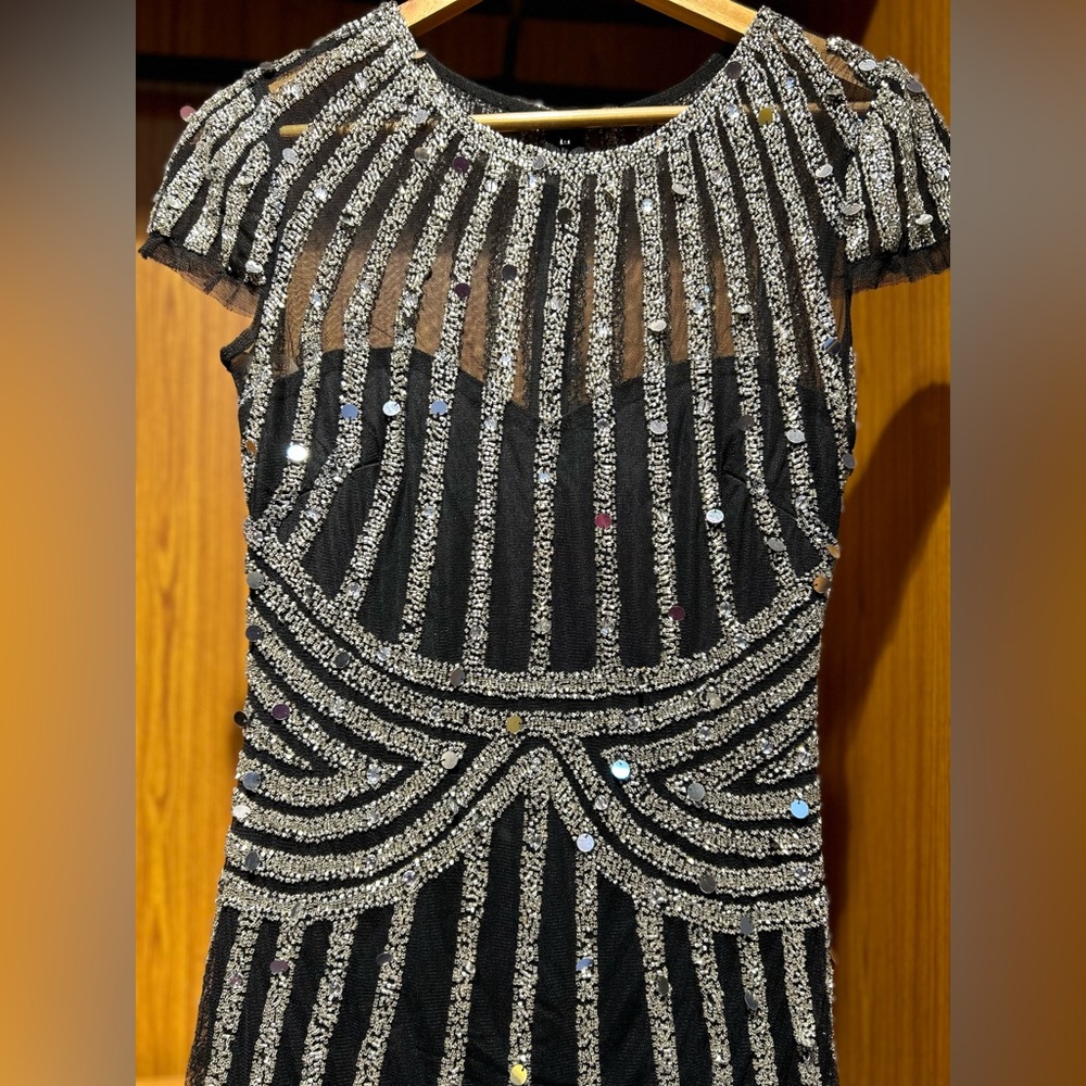 Long skinny black Elegence gown - Picture 2 of 11